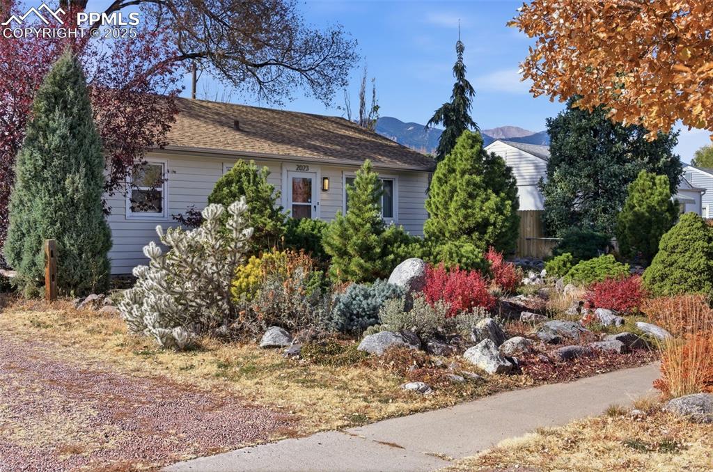 View of front of home featuring a mountain view