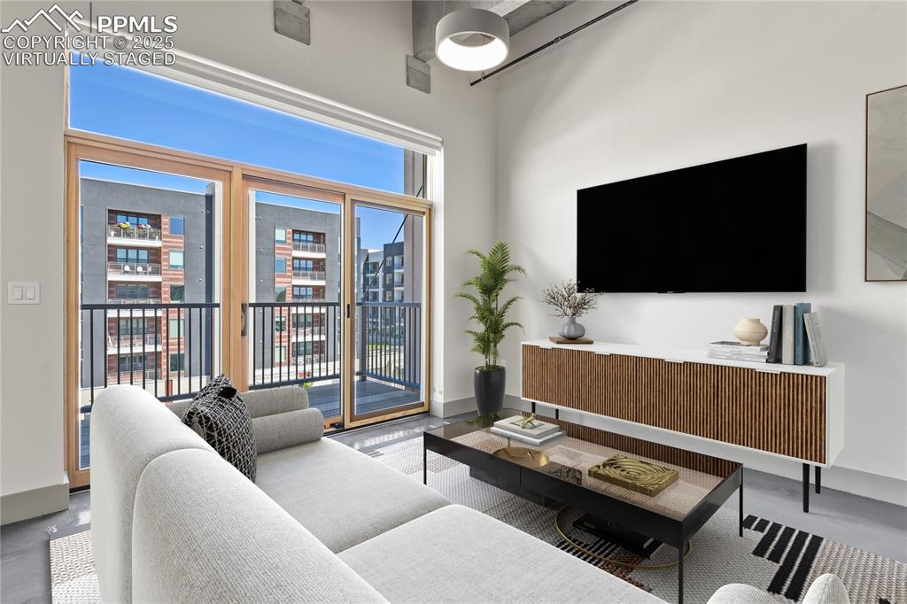 Walk-out to private balcony. Virtually Staged