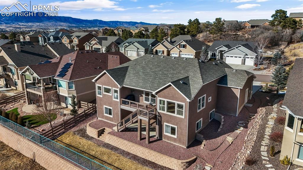 Aerial view of residential area with a mountain backdrop