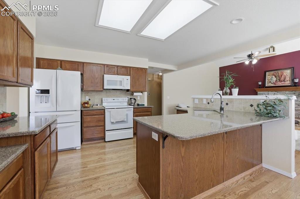 Kitchen with beautiful hardwood floors.