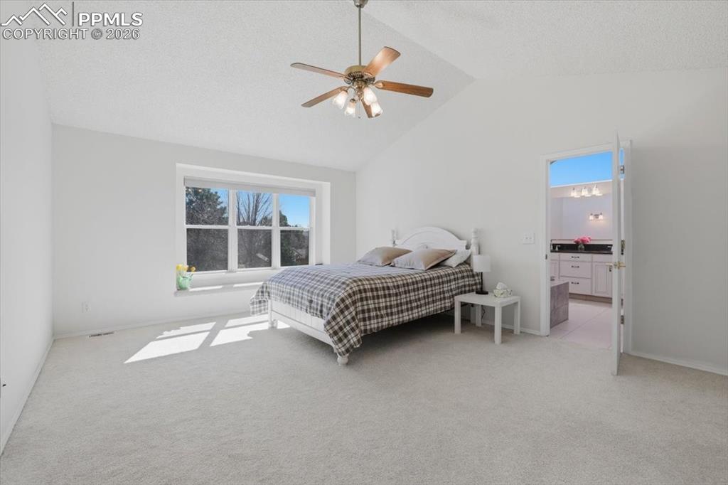 Primary suite with attached bathroom.