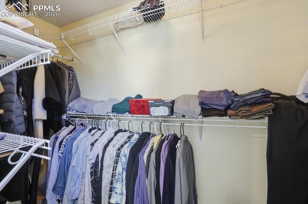 Large walk-in closet off primary bathroom.