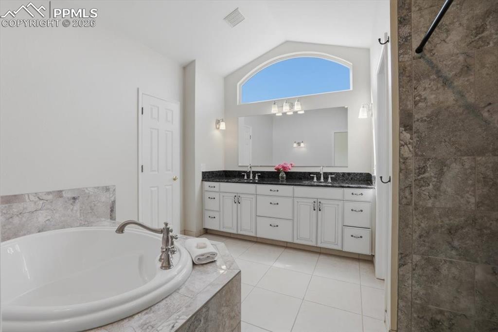 Luxurious primary suite bathroom.