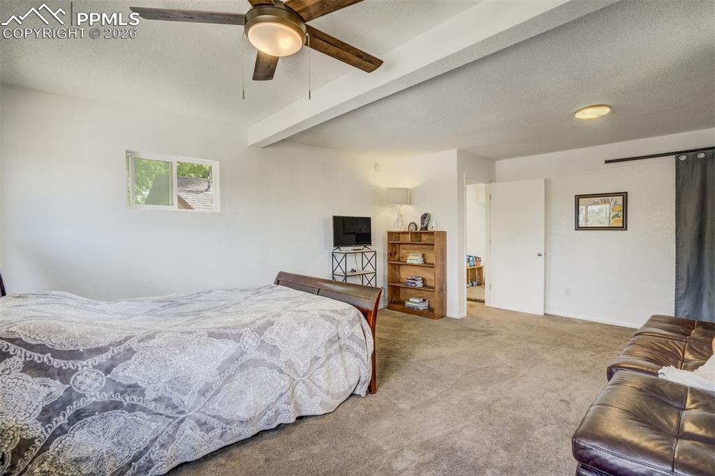 Primary bedroom with sitting area