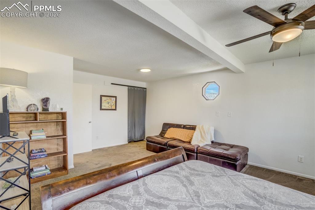 Primary bedroom with sitting area 