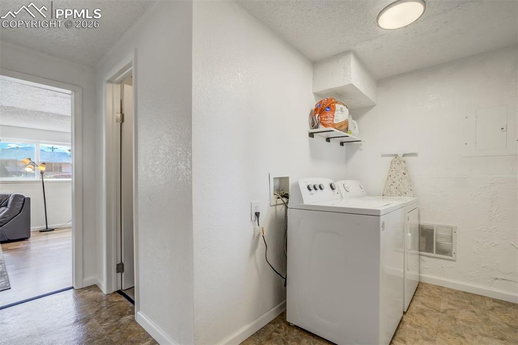 Laundry area with walk out