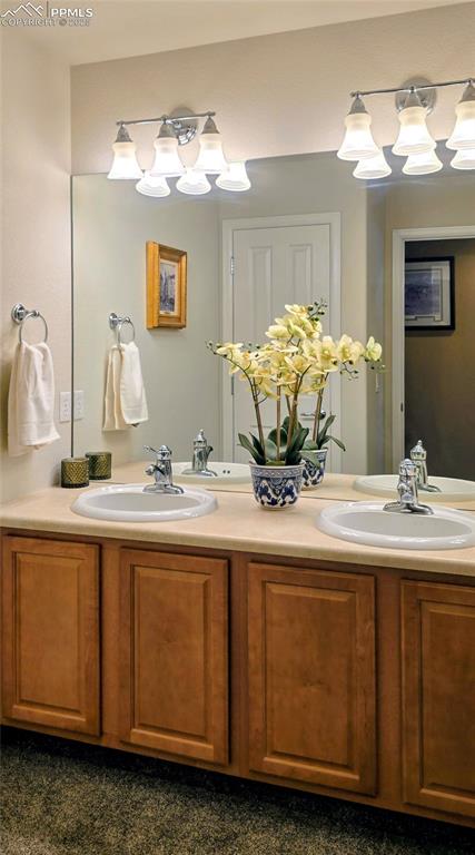 Bathroom featuring double vanity