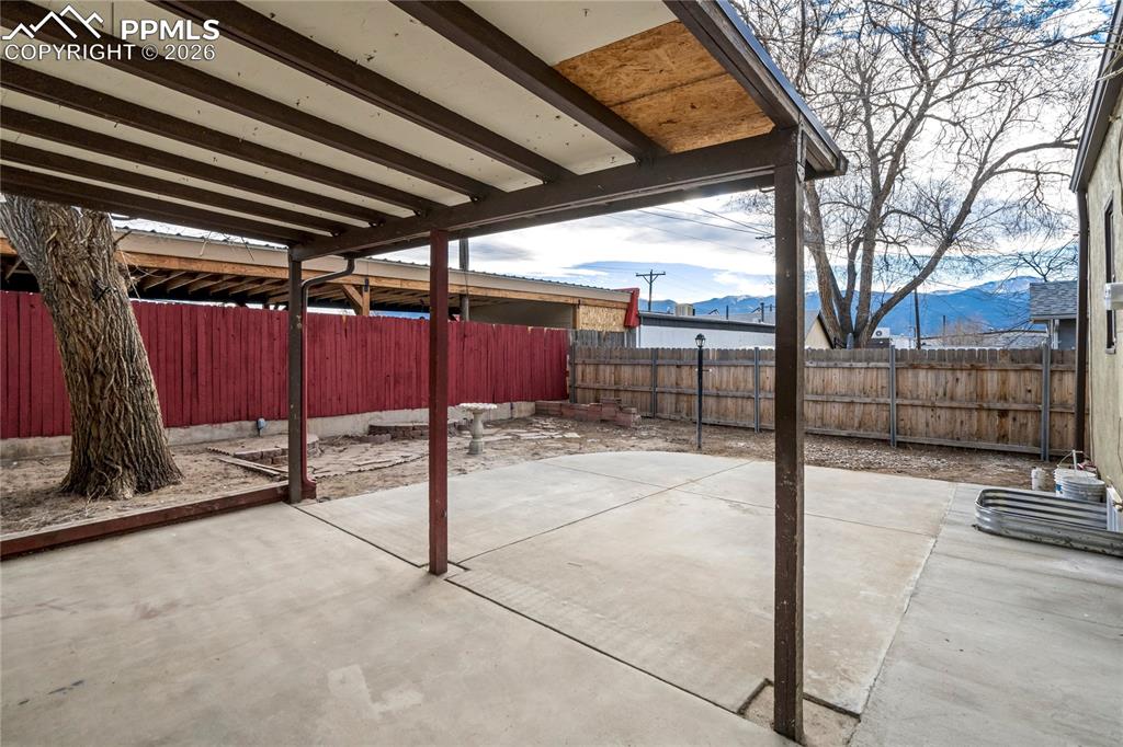 Fenced backyard with mountain views for those Colorado sunsets.