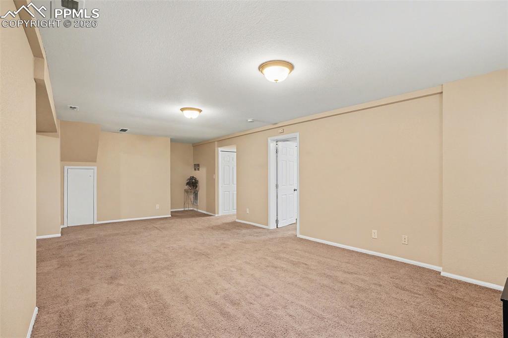 Expansive basement family room, ideal for game nights or movie marathons
