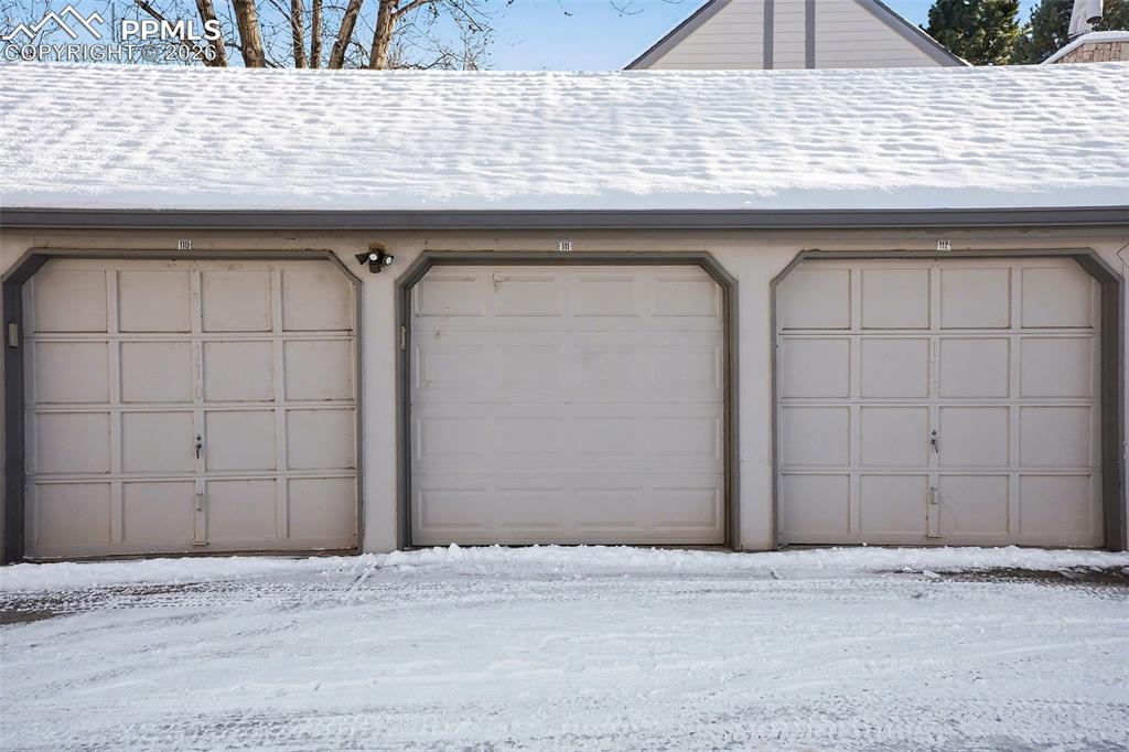 Detached garage with ample space for vehicles and storage