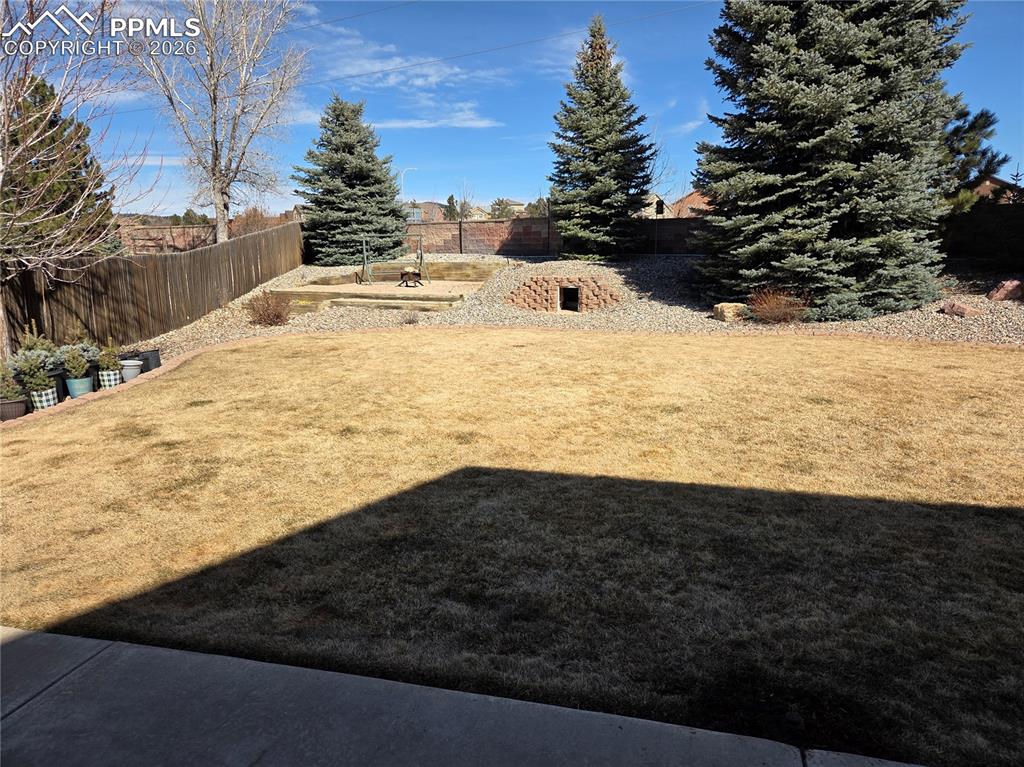 View of fenced backyard