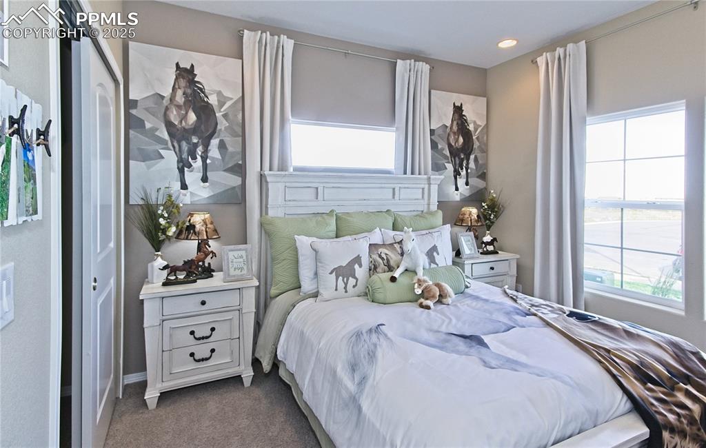 Bedroom featuring carpet floors
