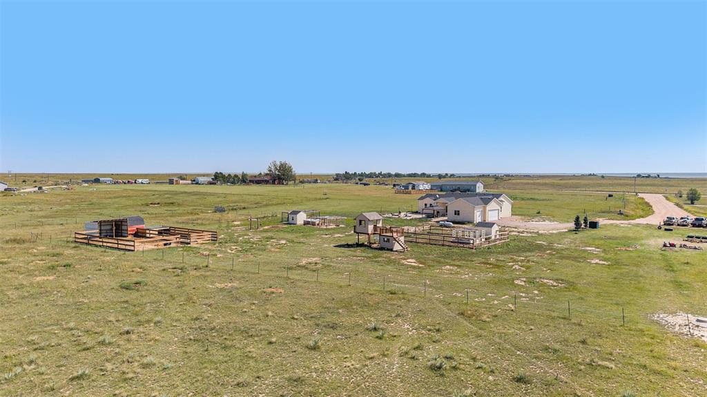 Aerial view of sparsely populated area featuring agricultural land