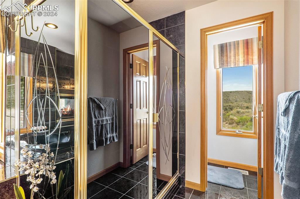 Bathroom with tile flooring