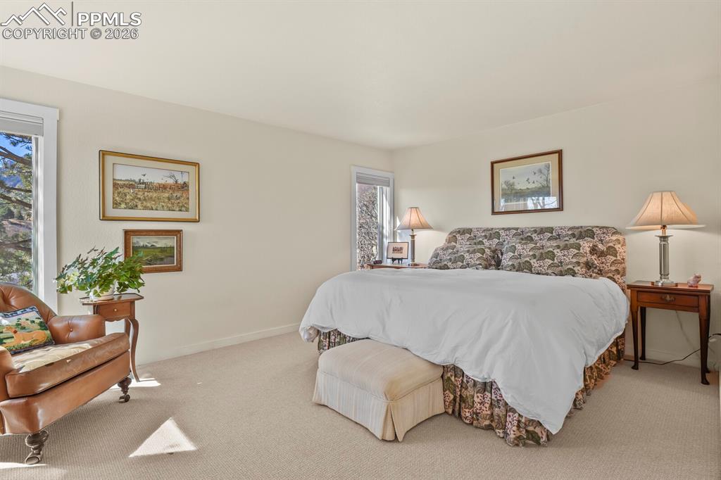 Primary bedroom, part of the primary suite.  Plenty of light.