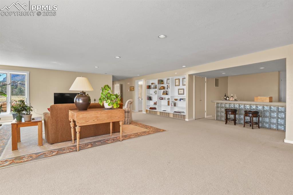 Another view of the Second Family Room, showing the bar area and the shelving available.  