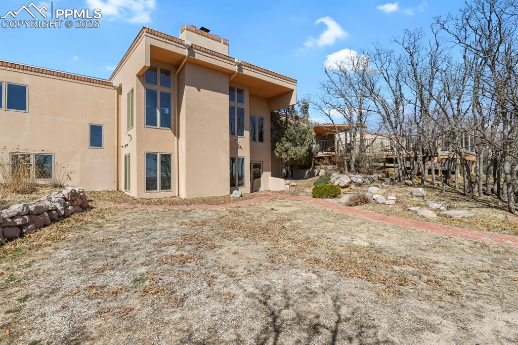 Rear view of stucco finishes on the home.