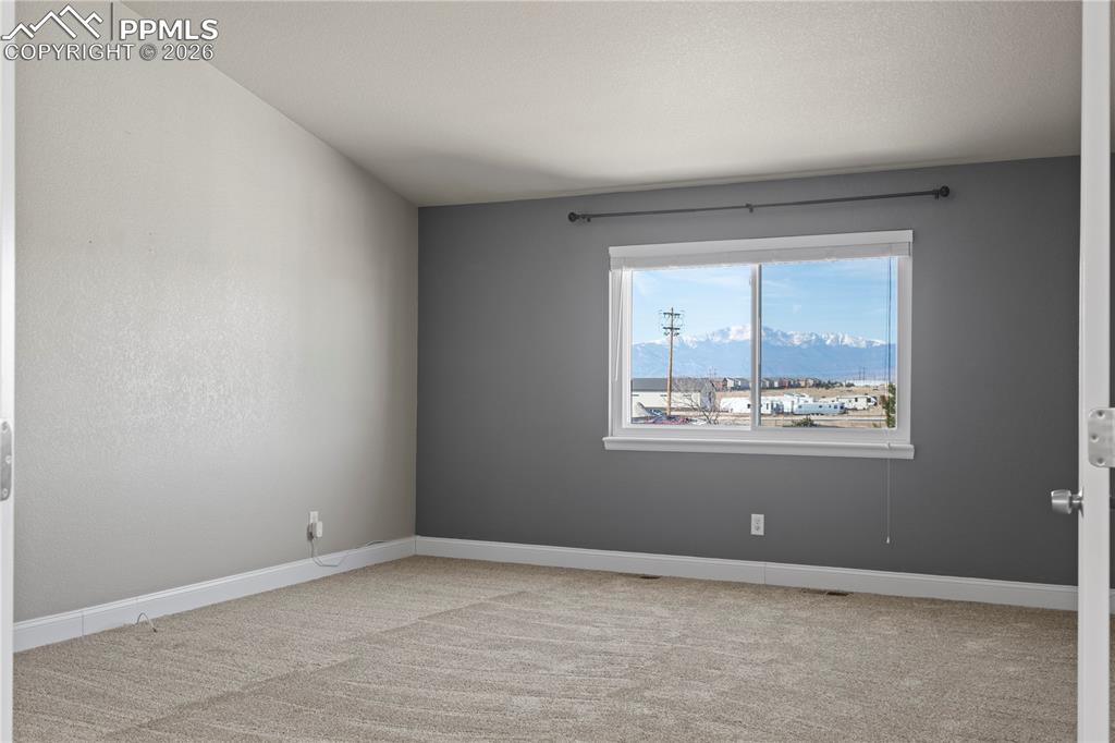 Large Primary with Epic Pikes Peak Views and New Carpet.