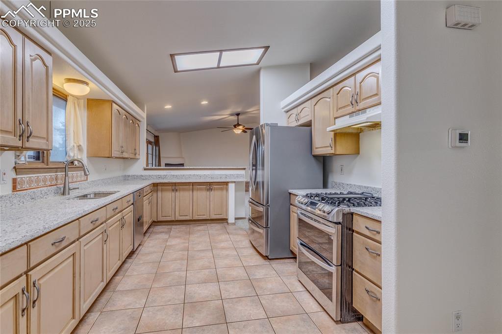 Kitchen from laundry room - all kitchen appliances are included. 