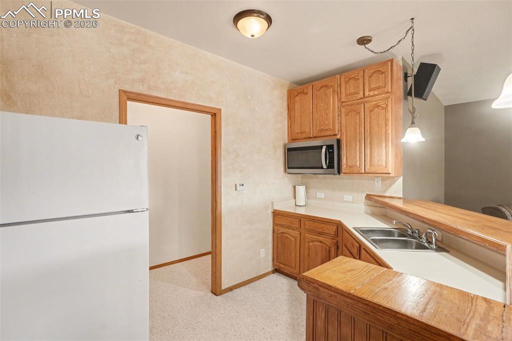 Wet bar with microwave (refrigerator excluded)