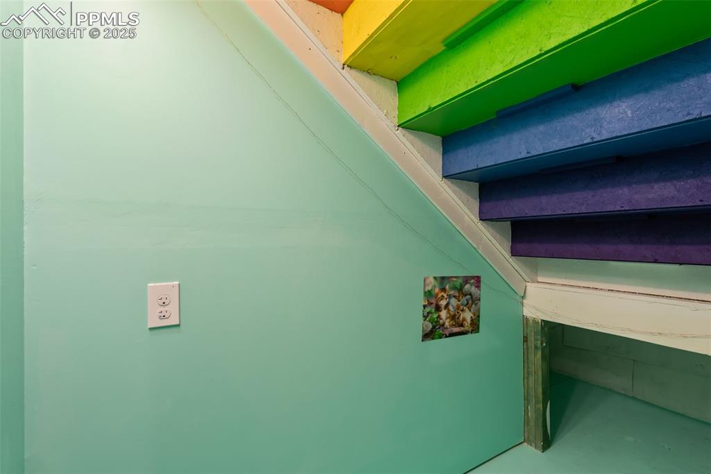 Kids play room under the stairs.