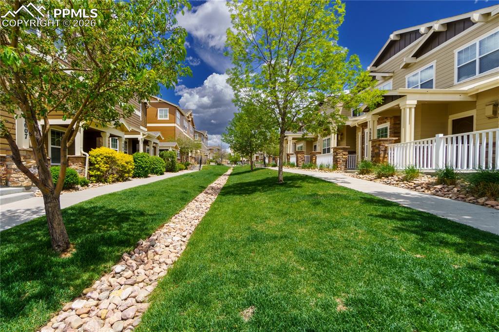 Surrounding community featuring a residential view and covered porch