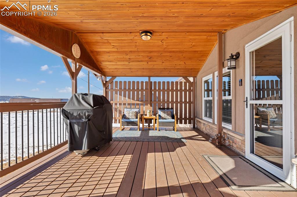 Deck featuring a grill