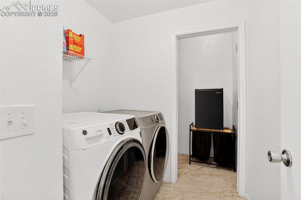 Convenient upper level laundry space