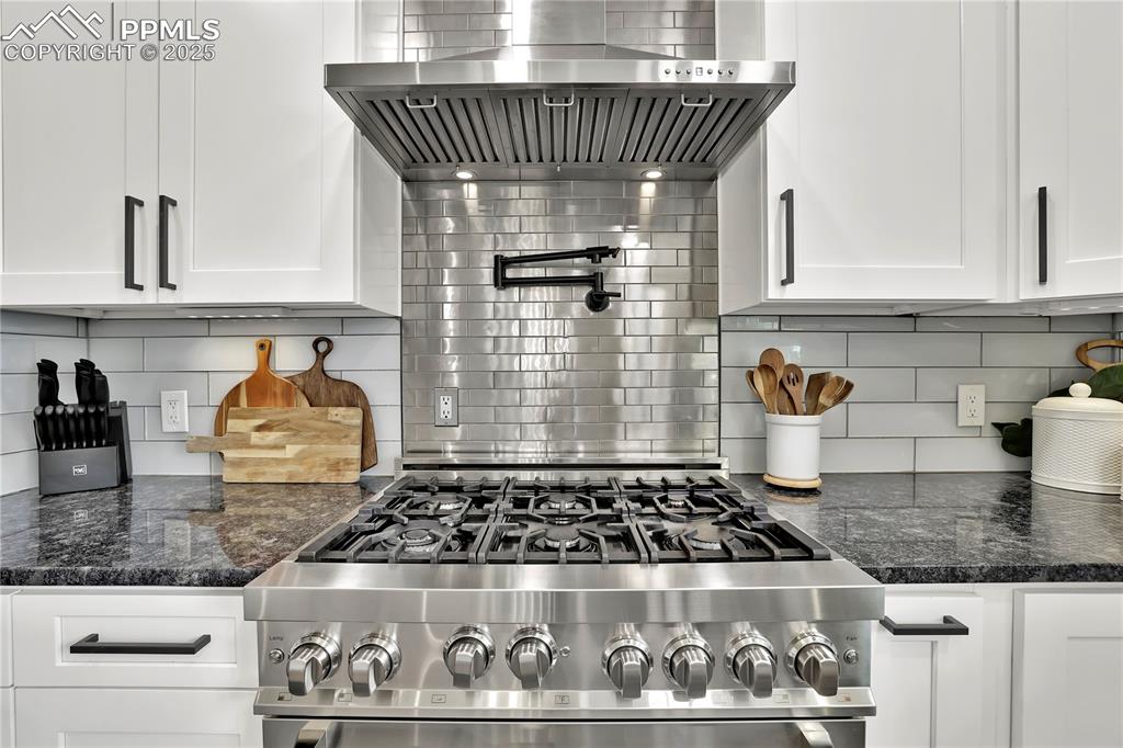 Custom Kitchen with gas range and hood