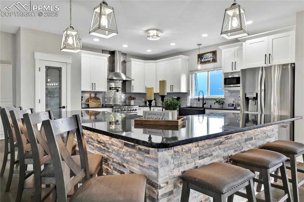 The setting at this island is GRAND, up to 8 comfortably plus serving and prep space!