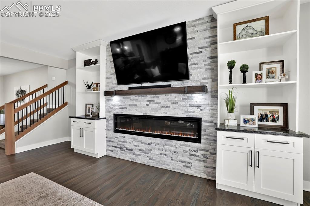 This wall is a show stopper in the living room! Custom built and stunning with granite! 