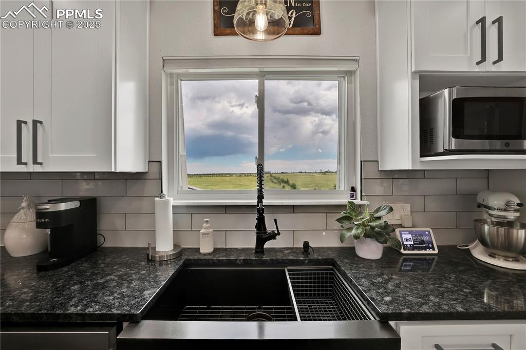 Views from every window in this home! Granite and modern finishes 