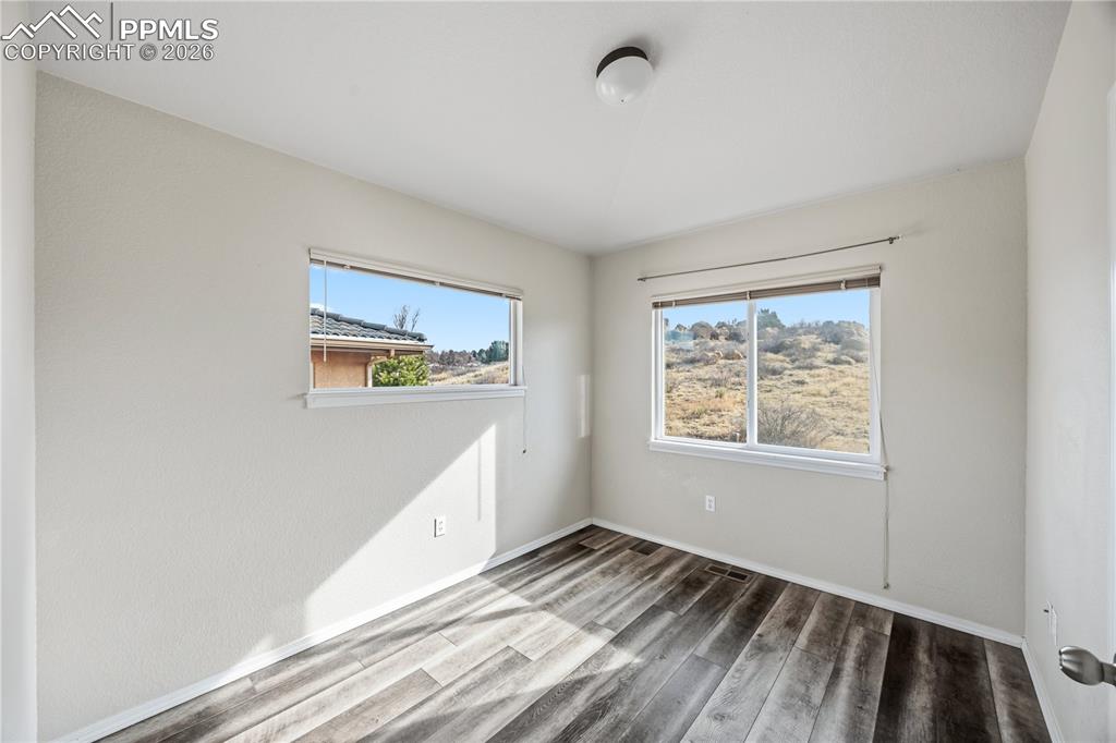 Bedroom #2 has LVP floors, and view windows.