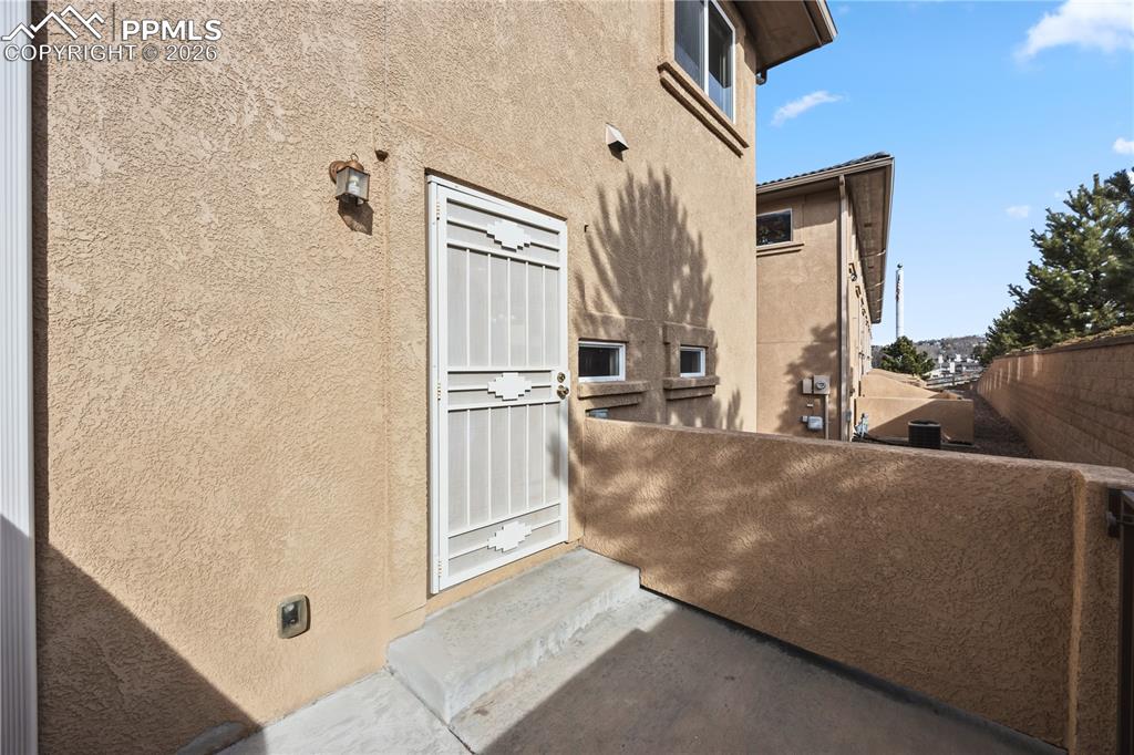 Walkout from the Kitchen to the enclosed patio.