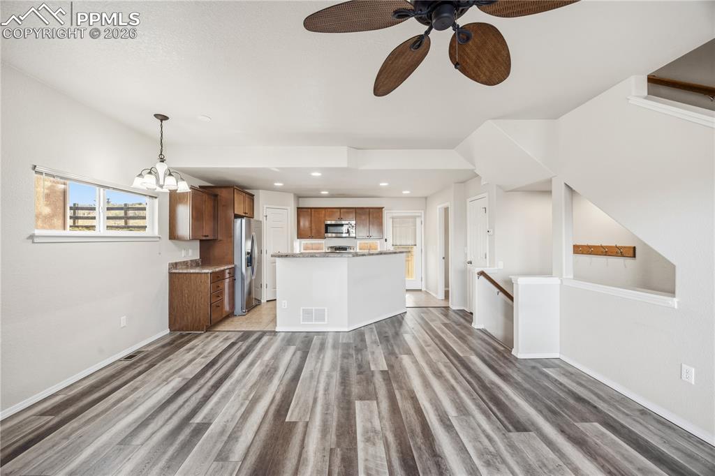 View of the Dining Area and Kitchen from the Living Room.