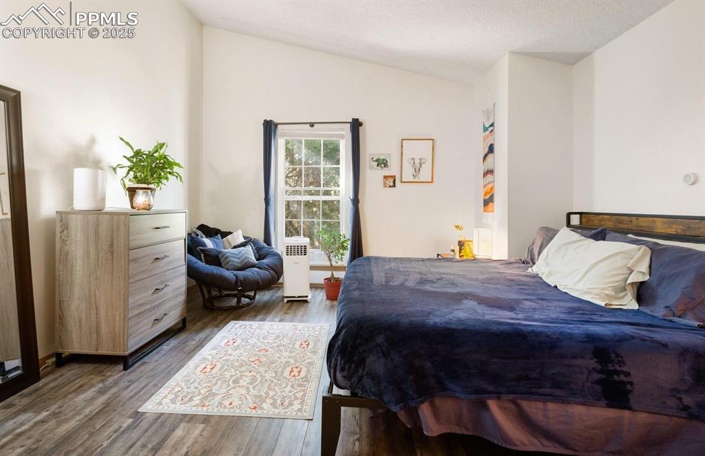 Primary Bedroom featuring LVP flooring