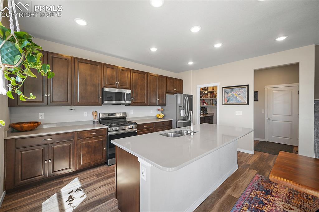 Gourmet kitchen with oversized stone island