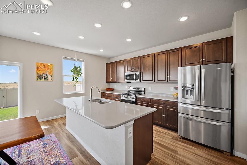 Open concept kitchen with with high end appliances