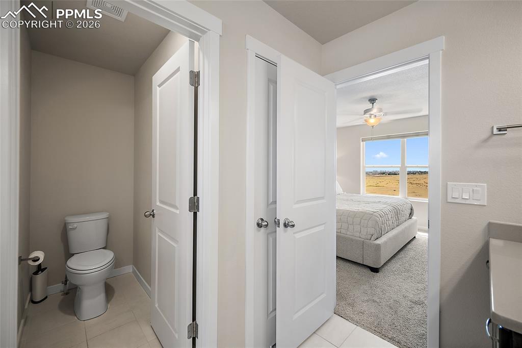 Primary bathroom with private toilet room