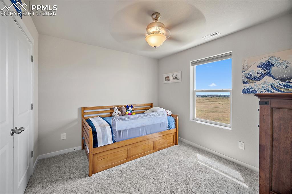 Third bedroom with beautiful view of open space