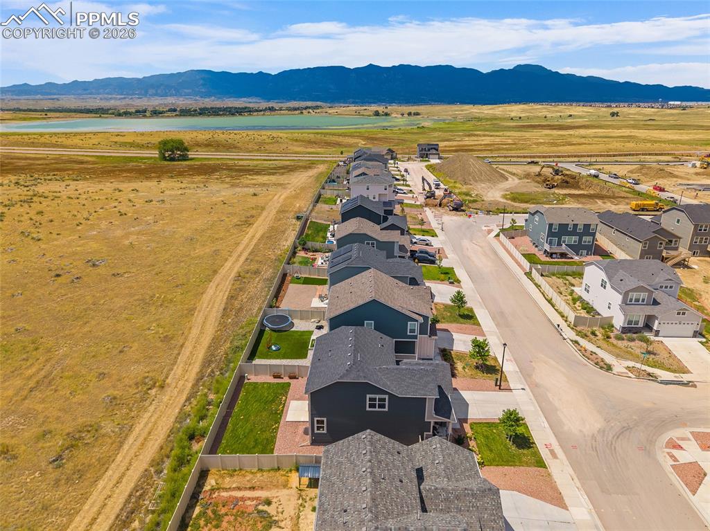 View of the property, open space, and mountains