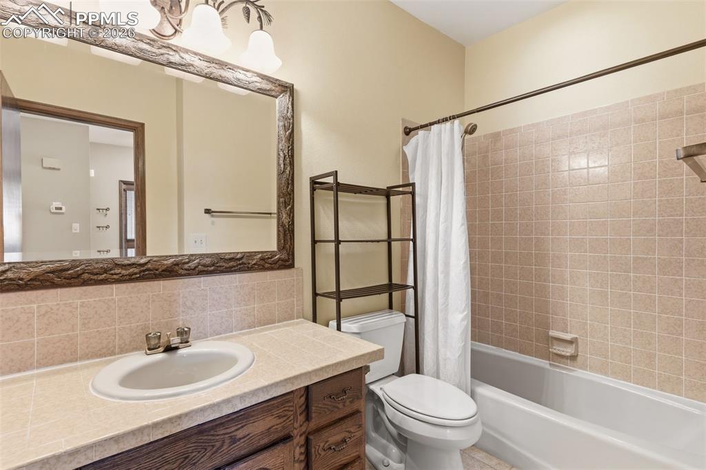 2nd bathroom with a tub shower combo