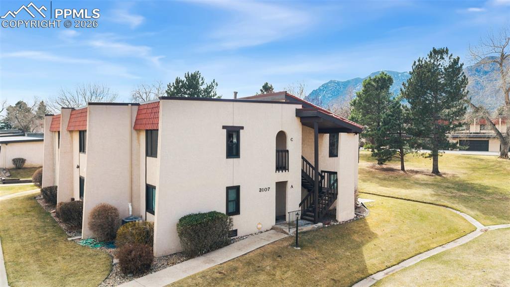 Stucco exterior and tile roof