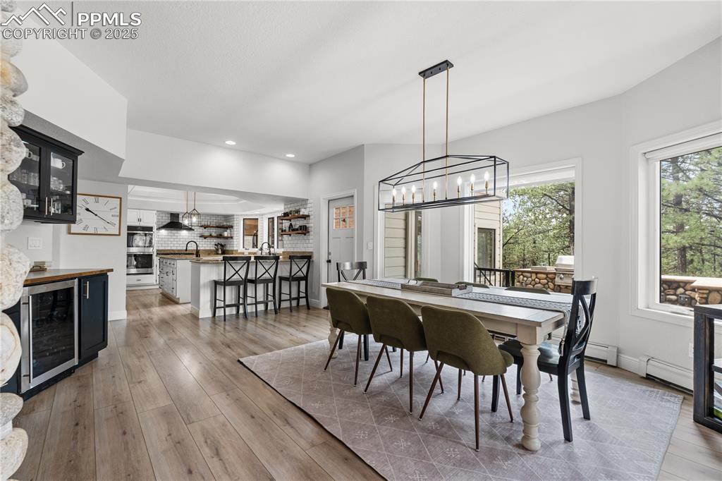 The kitchen has multiple seats for large family gatherings or parties