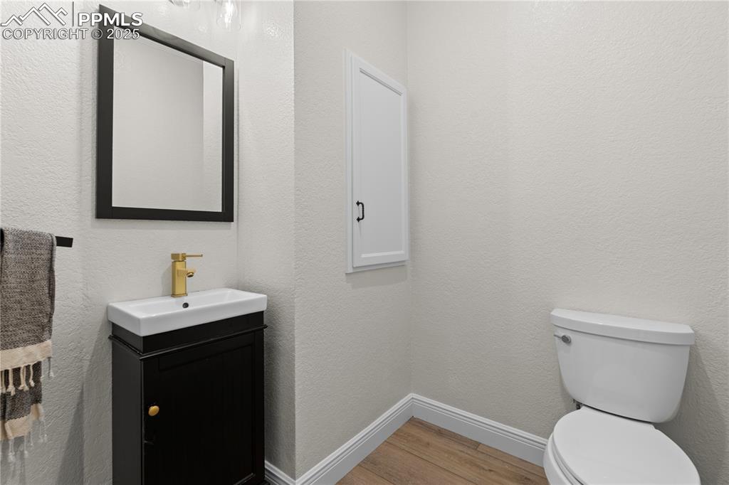 The powder room on the main floors adds convience to guests