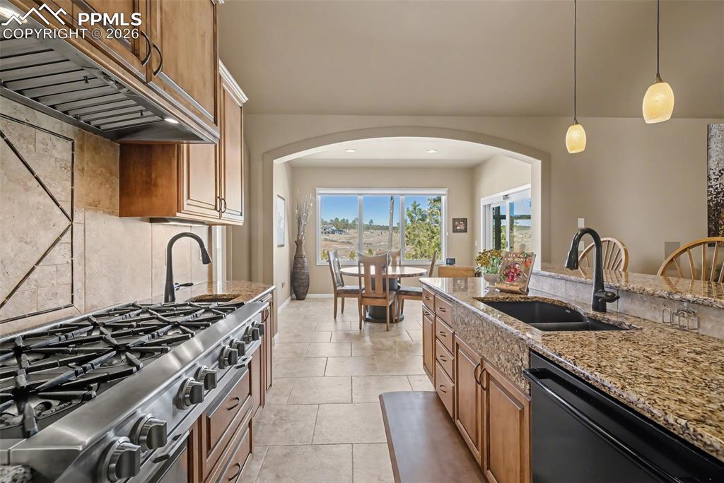 Gourmet kitchen to include an 8 burner BlueStar gas cooktop