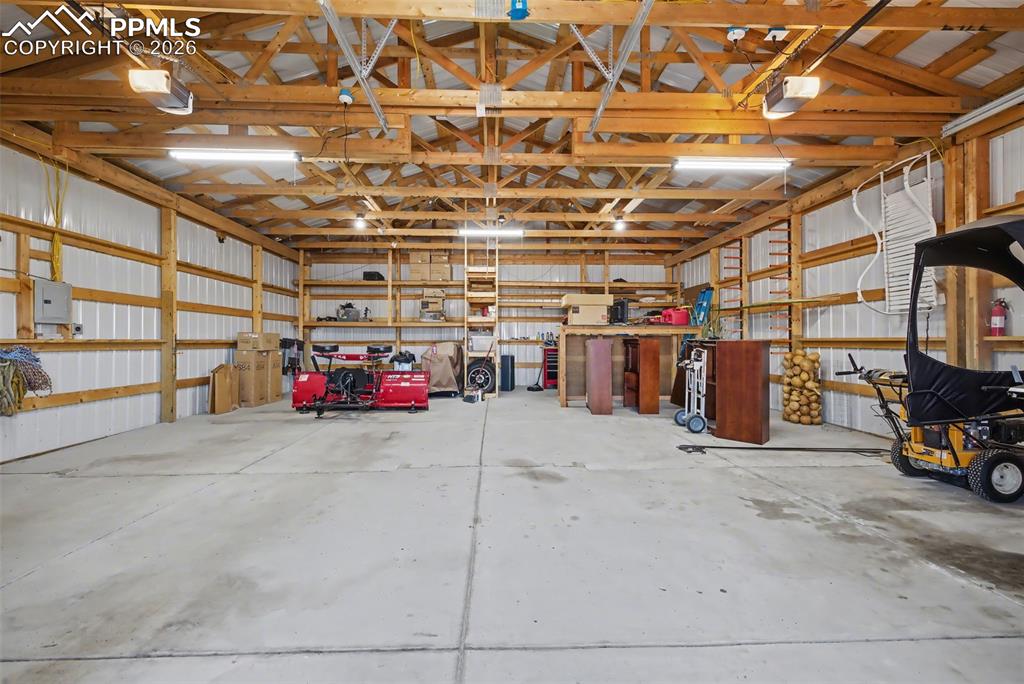 32x40 pole barn with concrete floor and 220v service for all the cars and all the things!