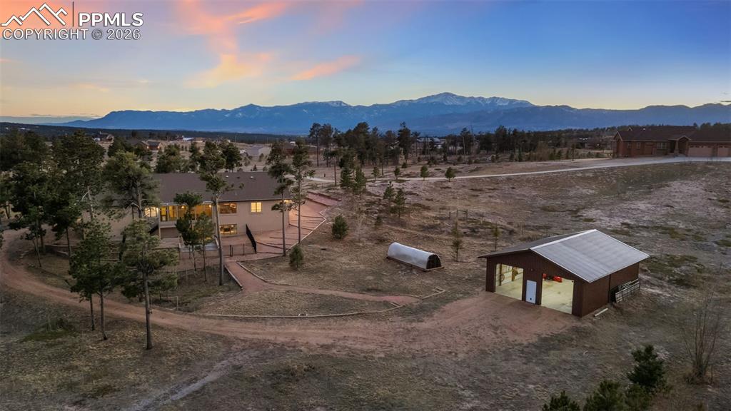 Over 5.5 acres of treed perfection with pole barn and greenhouse!