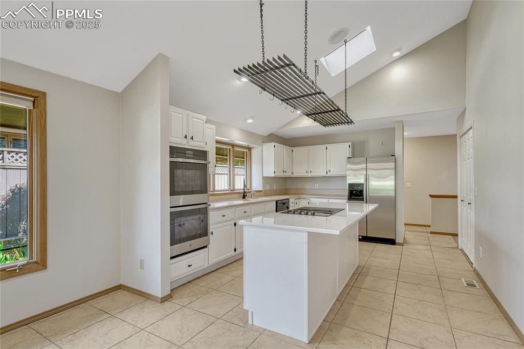 Vaulted Tiled Island Kitchen, Skylight