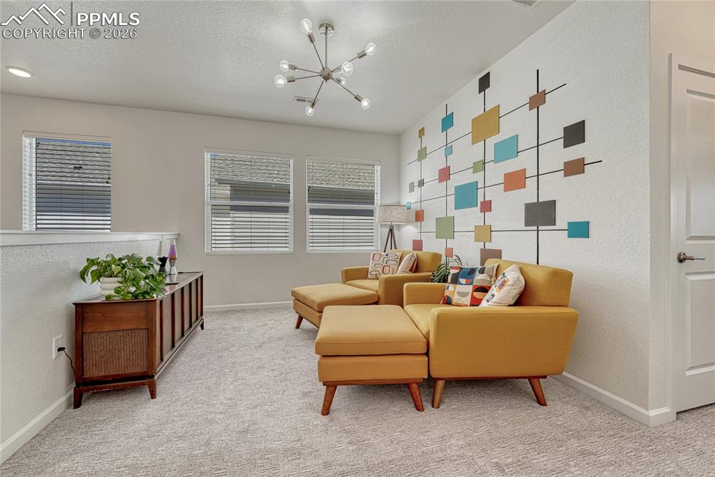 Head upstairs to a large loft space that could be used as a sitting area, office or game space
